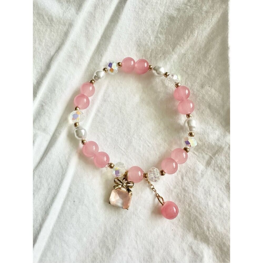 Iridescent and peach color beaded jewel charm bracelet